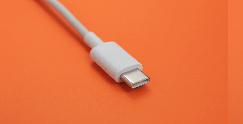 A close-up of a white USB-C charging data cable