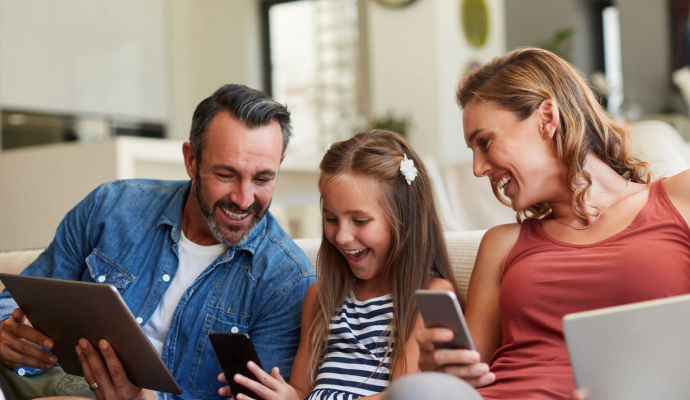 Happy family sitting together